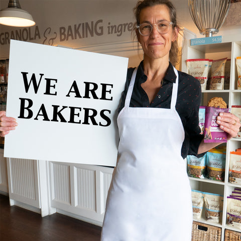 Erin holding a We Are Bakers sign