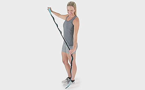 woman holding stretch strap to display length