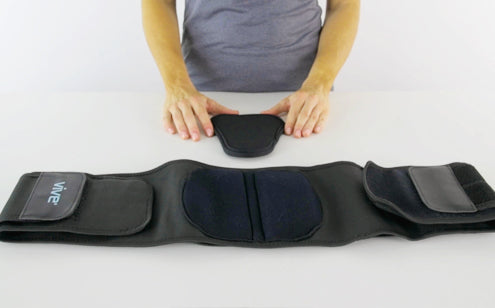 Removable lower spine cushion