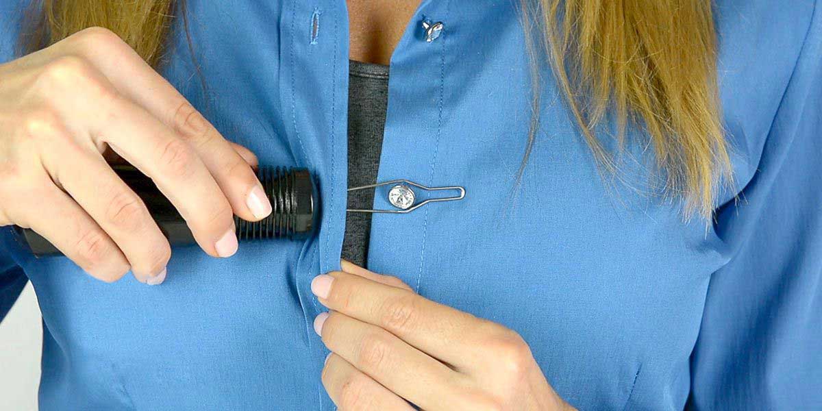 Woman using a button hook to get dressed  easily