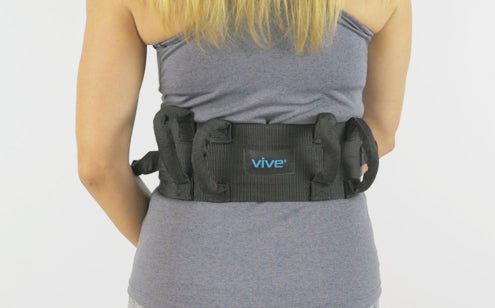 Woman wearing transfer belt with handles