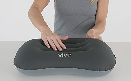 hand on lumbar cushion