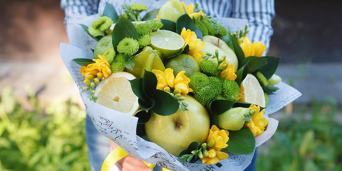 Fruit and with flower arrangement