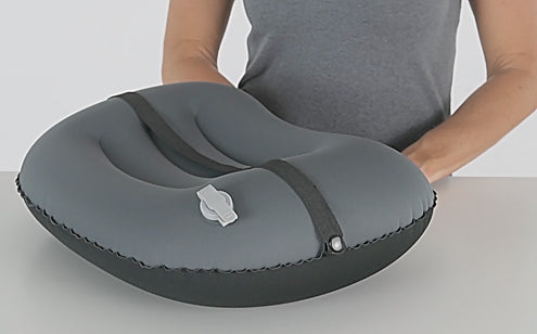 backside of lumbar cushion with strap