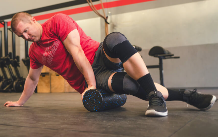 Man using foam roller