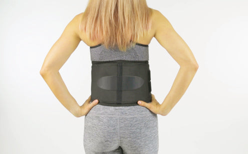Using back brace to support lower back injuries