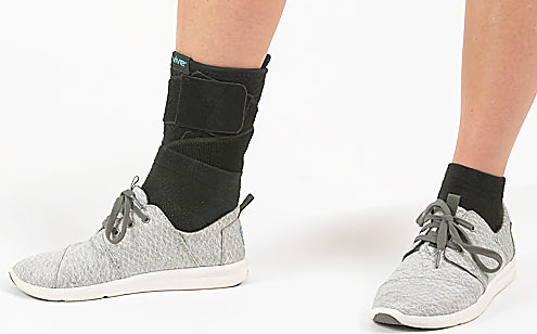 Wearing shoes with ankle brace support