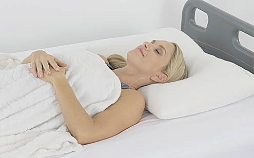 woman comfortable sleeping on bed with white pillow