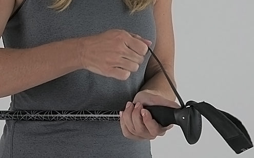 adjusting the wrist strap on trekking poles