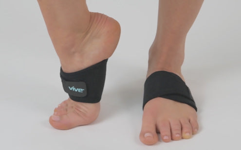 Feet wearing arc support