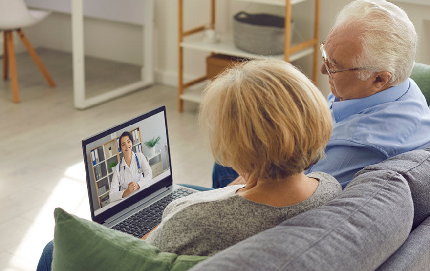 Senior using telemedicine services at home