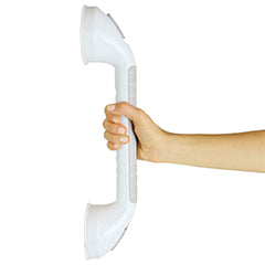 Hand holding a suction grab bar