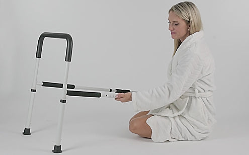 woman assembling the vive bed rail