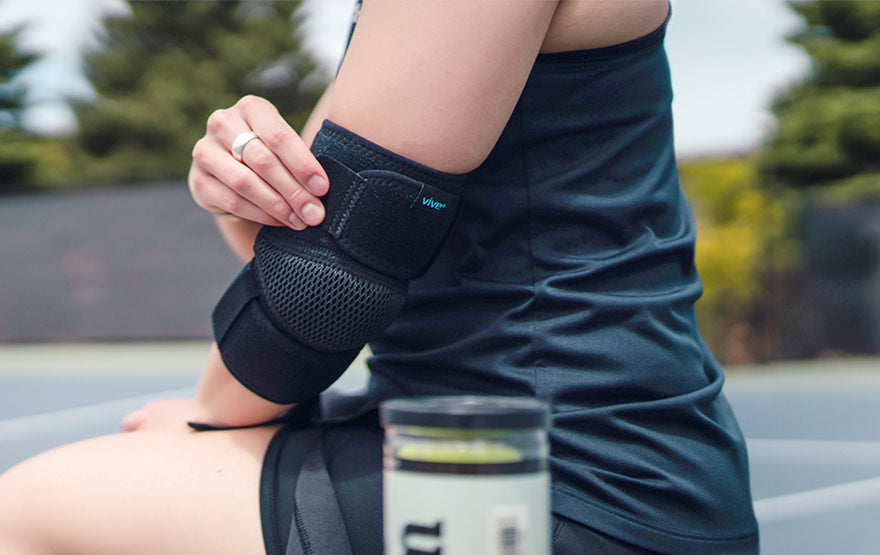 Woman Fasten Elbow Brace