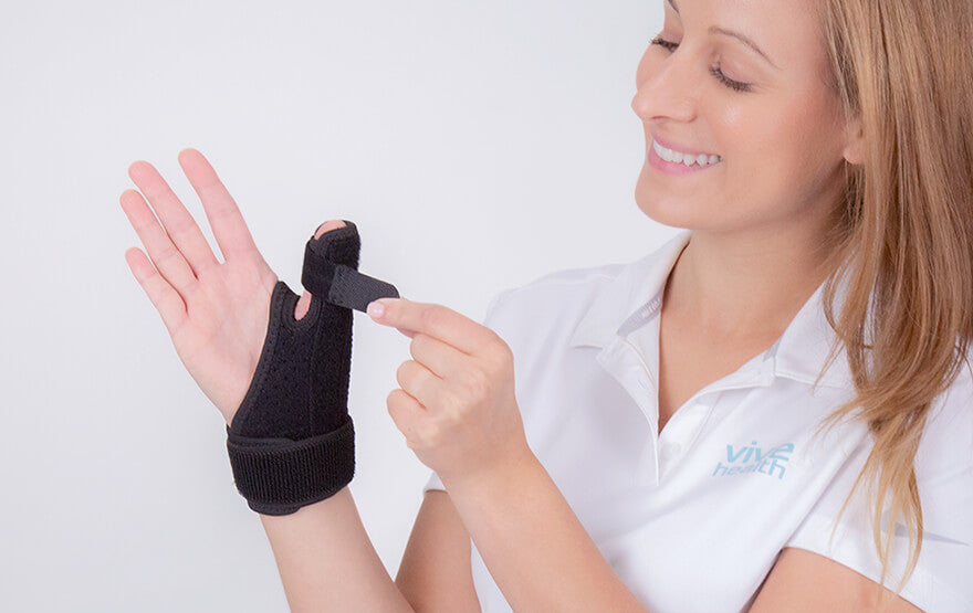 Woman Fasten Thumb Splint