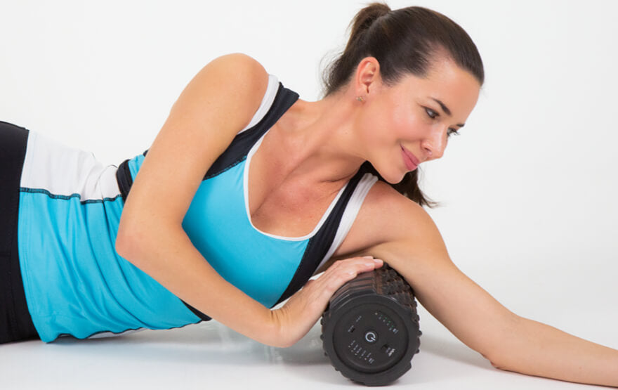 Woman using foam roller