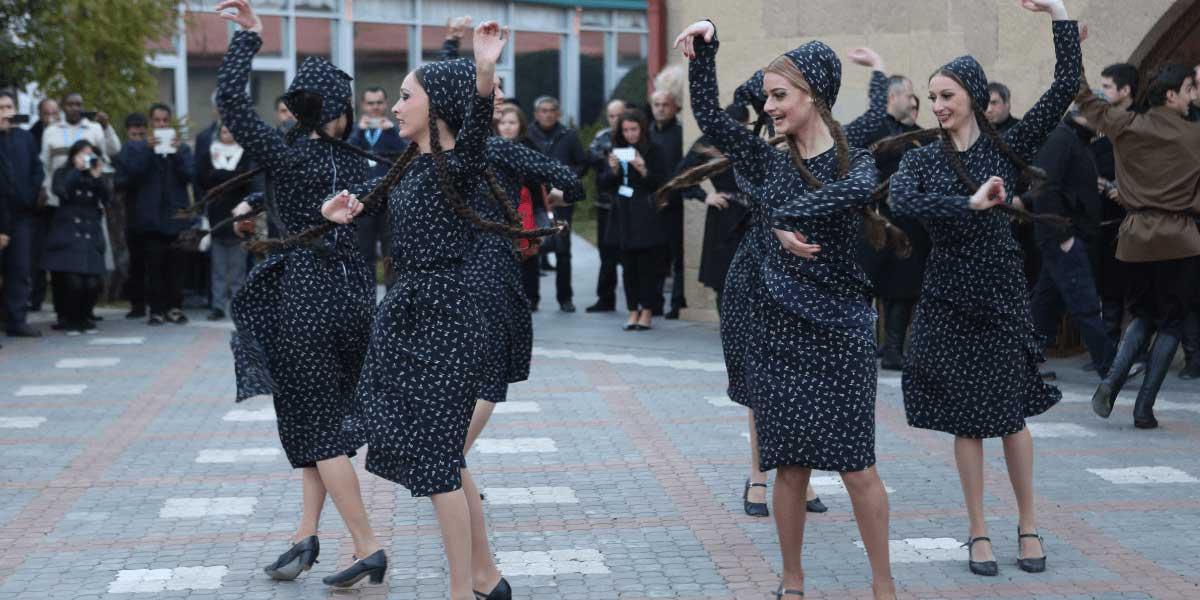 women dancing at cultural event