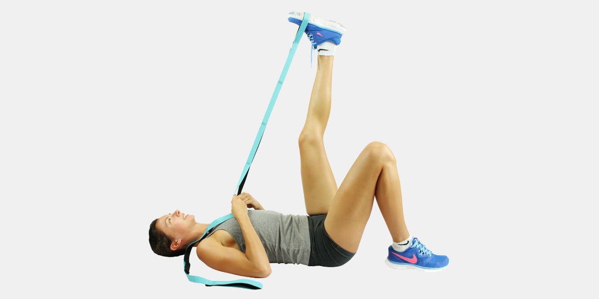 Woman using stretching strap by vive