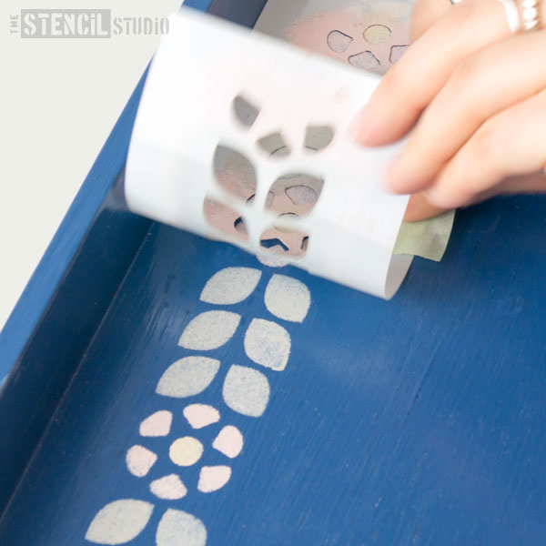 peeling off the stencil mini from the painted tray - tutorials by the stencil studio ltd