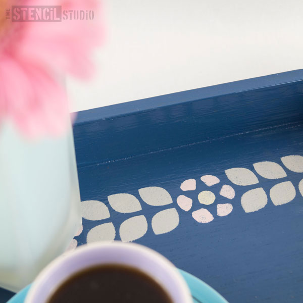 close up of the stencilled tray by the stencil studio Ltd dorit flower border stencil