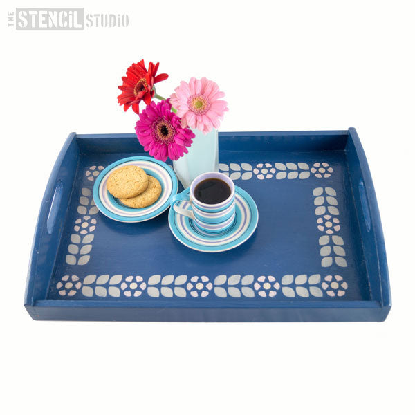 tray with coffee cups and biscuits - stencilled with dorit flower border stencil mini by the stencil studio Ltd