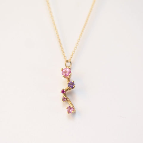 Statement necklace with pink sapphires and yellow gold