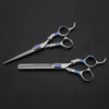 Silver hair cutting and thinning scissors in blue jeweled handles
