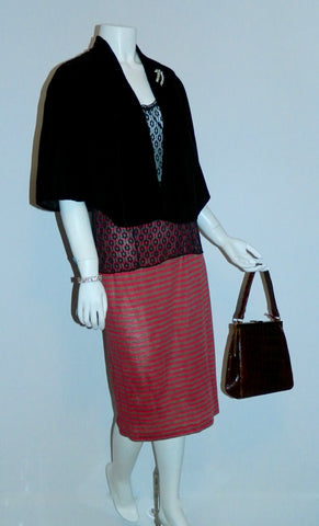 1950s velvet capelet and rhinestone jewelry, 1970s French lace camisole, 1980s wool jersey striped skirt, 1960s alligator bag.