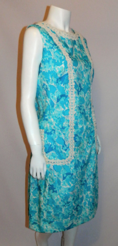 http://retro-trend-vintage.myshopify.com/collections/dresses-suits/products/vintage-lilly-pulitzer-sun-dress-aqua-blue-floral-print-shift-m-l
