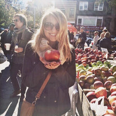 Our in-house dietician, Hannah Meier, at a farmers market. She contributes to our nutrition and health-related blog posts. 