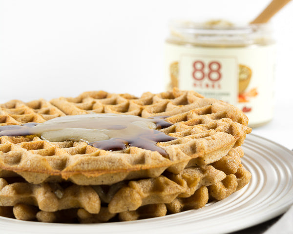 Maple syrup and pumpkin seed butter with waffles. Our newest line of Pumpkin Seed Butter contains no added sugar. 