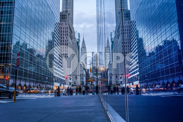 Chrysler Building in early evening from low angle street view - skyscraper on 42nd street in Midtown Manhattan NYC
