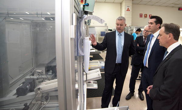 Photo (L-R): Mr Steve van Winckel, Global Supply Chain Manager, Trajan, Dr Andrew Gooley, Chief Scientific Officer, Trajan, Mr Michael Sukkar MP, Federal Member for Deakin, Victoria, Australia, Hon. Greg Hunt MP, Federal Minister for Industry, Innovation and Science, Australia.