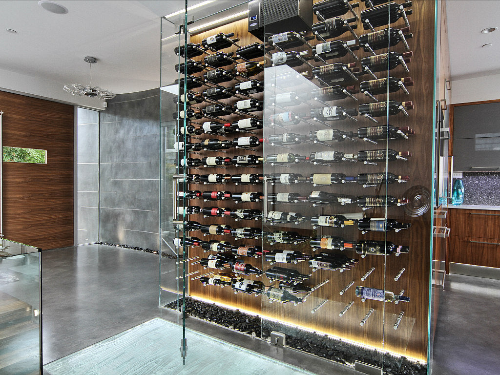 Wine storage on a custom wine wall rack using a peg system.