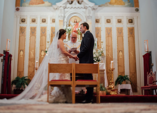 catholic church wedding with cathedral mantilla veil