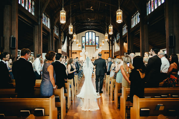 cathedral wedding with long cathedral mantilla veil