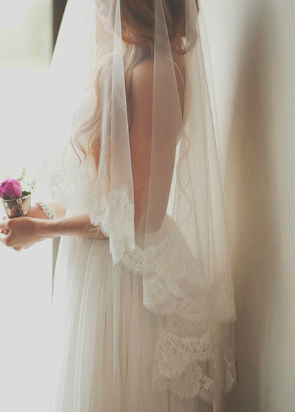 mantilla style fingertip length veil with blusher