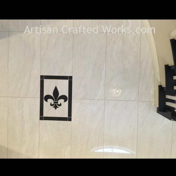 Black Fleur de Lis medallion made from porcelain tile - installed in foyer.