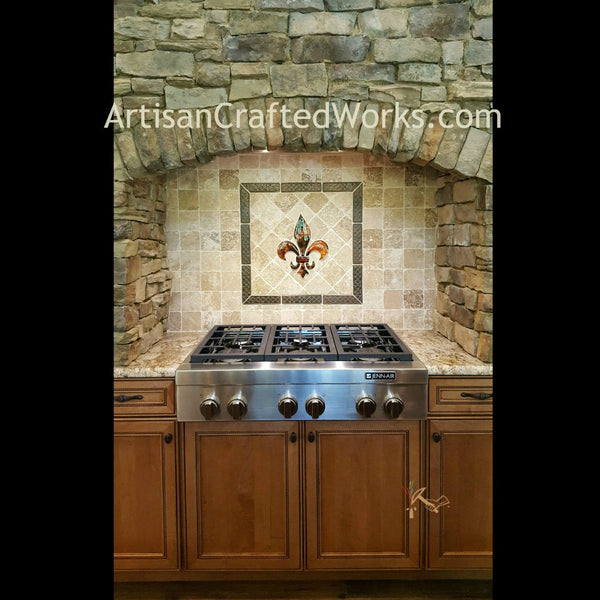 After installation photo of custom made kiln fired glass fleur de lis with travertine surround and resin border.