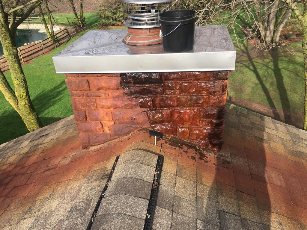 Rust on Stone Chimney