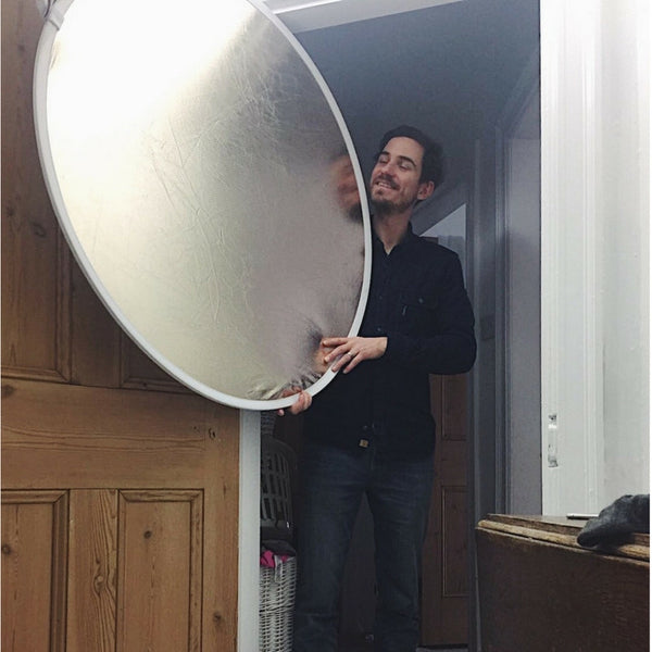 Jon holding mirror