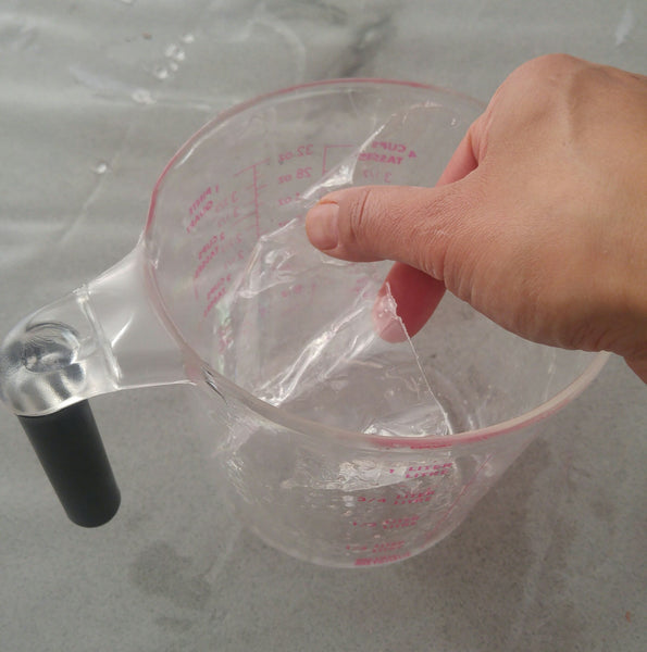 Cleaning Epoxy Resin Mixing Containers - Toss the peeled resin pieces into the trash