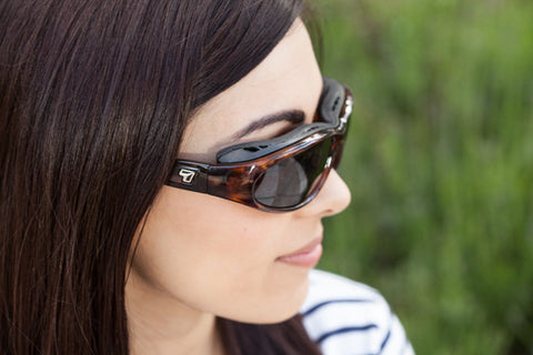 Woman wearing insulated sunglasses