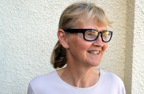 woman wearing moisture chamber glasses