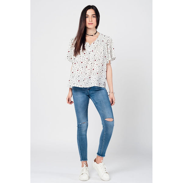 Skinny jeans in midwash with busted knees and chewed hems Skinny jeans in midwash with busted knees and chewed hems