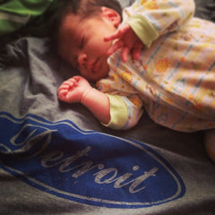 Our baby Bryn, enjoying the comfort of our luxurious triblend t-shirts!