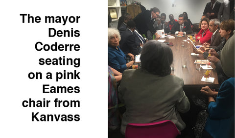 The mayor Denis Coderre seating on a pink Eames chair from Kanvass