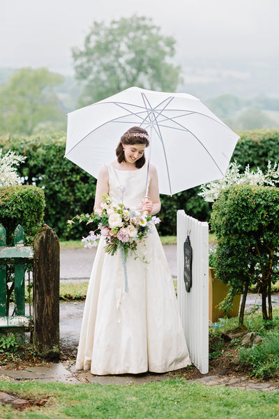 bride with umbrella