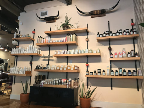 wall of products at Parlor Salon in Richmond, VA