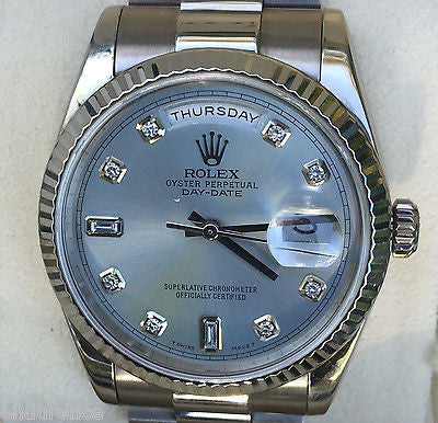 rolex with light blue face